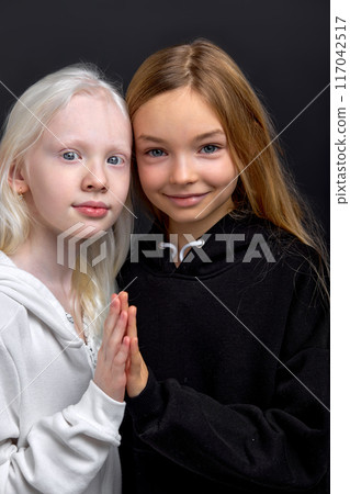 two classmates with different appearance support each other two classmates with different appearance support each other 117042517