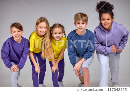 happy multiethnic children prepare to run happy multiethnic children prepare to run 117042555