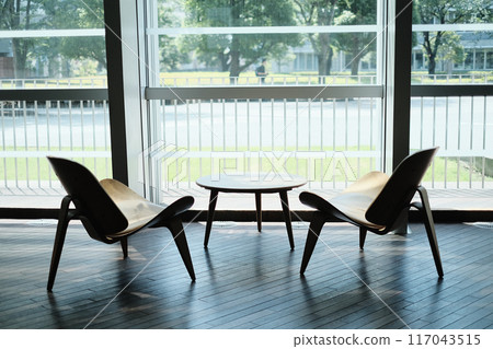 Two chairs and a table Two chairs and a table 117043515