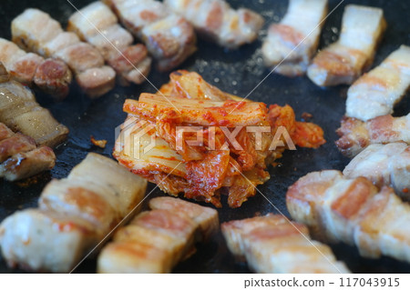 Korean food, pork belly and kimchi on the pan Korean food, pork belly and kimchi on the pan 117043915
