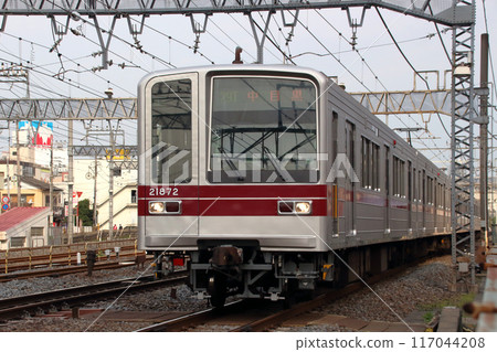Tokyo Metro Hibiya Line direct 20070 series train passing in front of Kasukabe Station Tokyo Metro Hibiya Line direct 20070 series train passing in front of Kasukabe Station 117044208