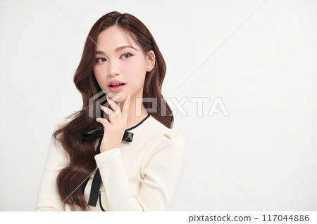 Beautiful young asian woman with clean fresh skin on white background, Face care, Facial treatment, Cosmetology, beauty and spa, Asian women portrait. 117044886