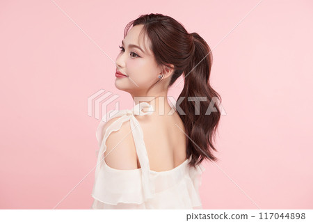 Beautiful young asian woman with clean fresh skin on pink background, Face care, Facial treatment, Cosmetology, beauty and spa, Asian women portrait. 117044898