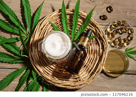 Hemp cannabis leaves and cbd oil products Hemp cannabis leaves and cbd oil products 117046216