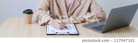 Business woman employer holding resume hiring recruit looking cv resume to hire candidates, analyzing information before job interview. Recruitment concepts Business woman employer holding resume hiring recruit looking cv resume to hire candidates, analyzing information before job interview. Recruitment concepts 117047181