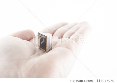 image of book hand white background 117047970