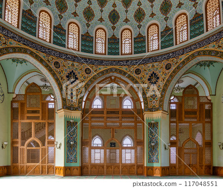 Interior of Taza Pir Mosque in Baku, Azerbaijan, with ornate dome and intricate architecture 117048551