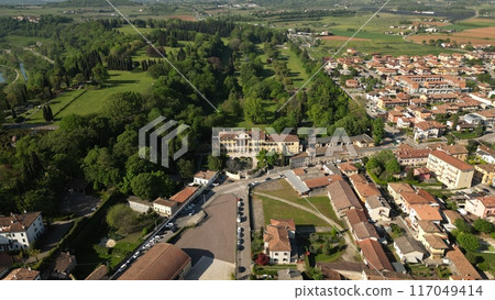 Aerial view Valeggio sul Mincio is a comune in Italy, located in the province of Verona, Venice region. View of a beautiful park and city Aerial view Valeggio sul Mincio is a comune in Italy, located in the province of Verona, Venice region. View of a beautiful park and city 117049414