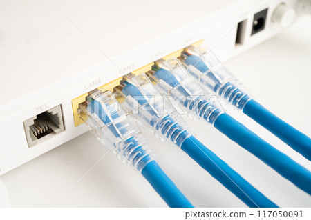 Ethernet cable with wireless router connect to internet service provider internet network. Ethernet cable with wireless router connect to internet service provider internet network. 117050091