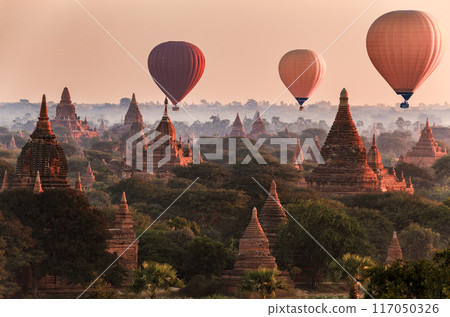 Balloon over plain of Bagan in misty morning, Myanmar Balloon over plain of Bagan in misty morning, Myanmar 117050326