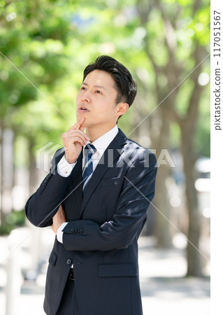 Businessman suffers Businessman suffers 117051567