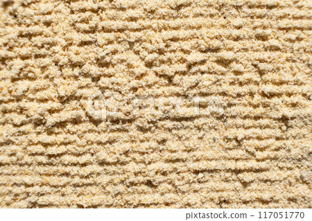 Abstract beige ground ginger background. Creativity in cooking. Abstract beige ground ginger background. Creativity in cooking. 117051770