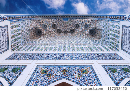 decor of white marble wall tiles with traditional Uzbek Islamic pattern ornament on Masjid Minor Mosque in Tashkent in Uzbekistan decor of white marble wall tiles with traditional Uzbek Islamic pattern ornament on Masjid Minor Mosque in Tashkent in Uzbekistan 117052450
