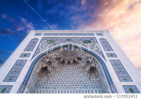 wall of Masjid Minor Mosque decorated ceramic white tiles with traditional oriental Arabic Uzbek ornaments in Tashkent in Uzbekistan wall of Masjid Minor Mosque decorated ceramic white tiles with traditional oriental Arabic Uzbek ornaments in Tashkent in Uzbekistan 117052451