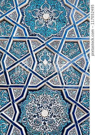 ceramic tile Uzbek mosaic with oriental Asian pattern decorated with blue and white ornament 117052495