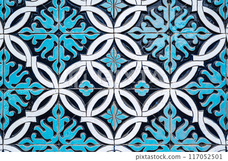 tile mosaic with oriental Arabic Uzbek pattern decorated with blue and white floral ornament 117052501
