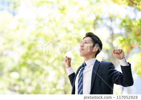 A businessman growing 117052928