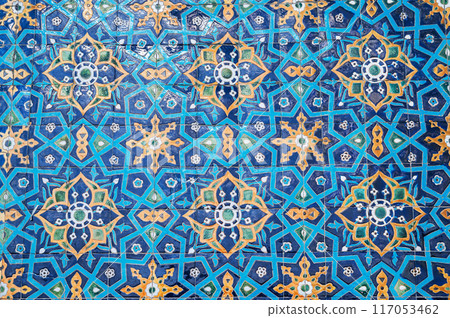 wall of Muslim mosque Hazrati Imam is decorated with ceramic tiles with traditional oriental Uzbek ornament Islamic pattern in Uzbekistan 117053462