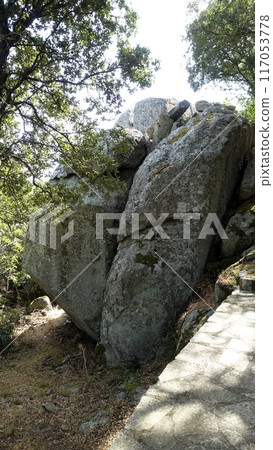 A glimpse of the giant rocks shaped by the wind present in the Gallura area of Sardinia. 117053778