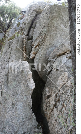 A glimpse of the giant rocks shaped by the wind present in the Gallura area of Sardinia. 117053779