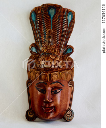 antique wooden Buddha mask Devi Ratih and Kala Raho 117054126