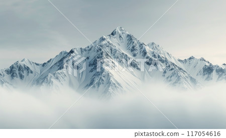 Snow-Capped Mountains Emerging Through Misty Clouds in a Serene Landscape 117054616