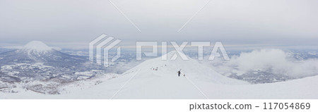 Panorama of Mt. Yotei and hikers in the backcountry area of Niseko Annupuri in Kutchan, Abuta-gun, Hokkaido 117054869