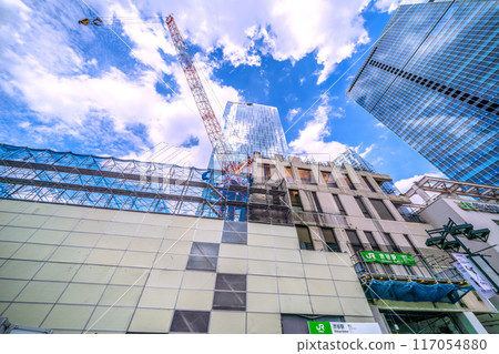 Tokyo cityscape in Japan: Goodbye, Shibuya Station West Exit... Demolition is underway, blue sky is visible... Redevelopment work... = August 1st Tokyo cityscape in Japan: Goodbye, Shibuya Station West Exit... Demolition is underway, blue sky is visible... Redevelopment work... = August 1st 117054880
