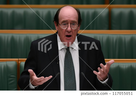 Debating Politics: Middle-Aged Politician Engages Audience Debating Politics: Middle-Aged Politician Engages Audience 117055051
