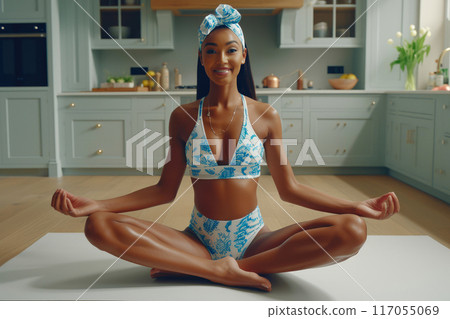 Tranquil Pregnancy: Mixed Heritage Woman Meditating Tranquil Pregnancy: Mixed Heritage Woman Meditating 117055069