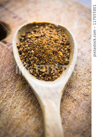 spices in a spoon 117055801