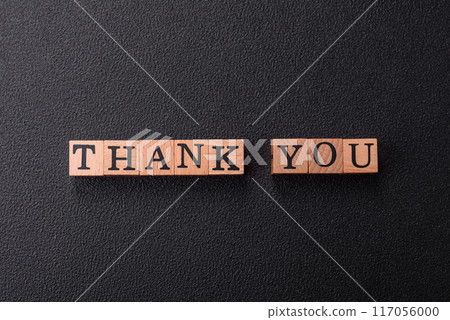 Inscription Thank you with wooden cubes, conceptual background with copy space Inscription Thank you with wooden cubes, conceptual background with copy space 117056000