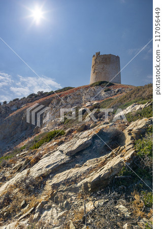 Ancient Spanish Watchtower Atop Rocky Sardinian Hill 117056449