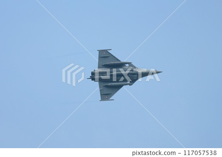A French Aerospace Forces Rafale fighter jet in motion A French Aerospace Forces Rafale fighter jet in motion 117057538