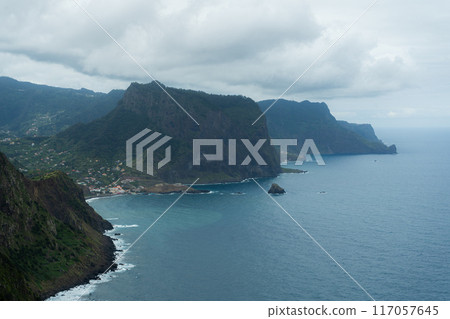 Penha d'Aguia Mountain on Cloudy Day and Ocean. Vereda do Larano. Madeira, Portugal 117057645