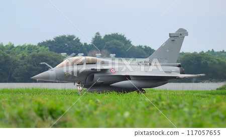A French Aerospace Forces Rafale B fighter plane taxiing. 117057655