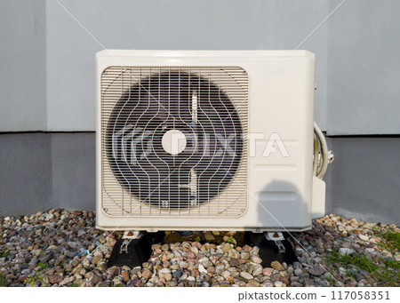 Outdoor Air Conditioning Unit on Gravel Base Realistic Photo 117058351