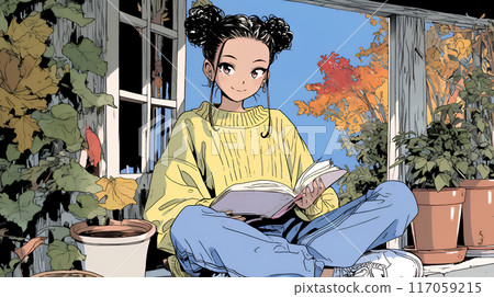 A young woman sitting by a window reading a book with autumn leaves in view 117059215