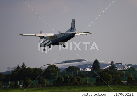 (Chofu Airport, Tokyo) A small passenger plane landing on the runway (Chofu Airport, Tokyo) A small passenger plane landing on the runway 117060221