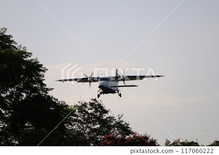 (Chofu Airport, Tokyo) A small propeller passenger plane begins to land (Chofu Airport, Tokyo) A small propeller passenger plane begins to land 117060222