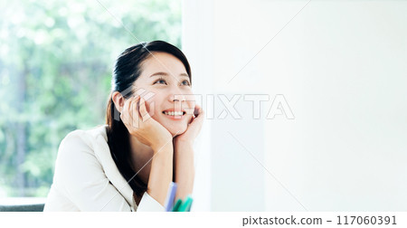 Woman dreaming about the future Woman dreaming about the future 117060391