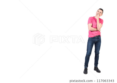 Man with dreamy look in studio. White background 117063343