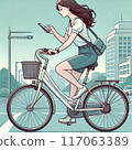 一名年輕女子騎自行車時使用智慧型手機 117063389