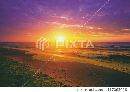 Seascape in the early morning. Sunrise over the sea Seascape in the early morning. Sunrise over the sea 117065018