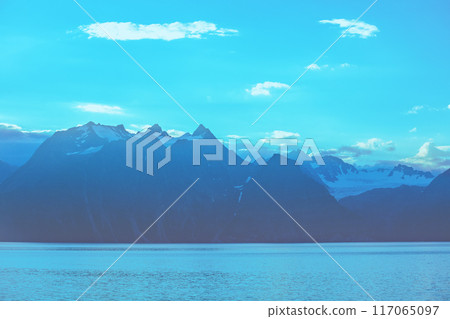 Rocky seashore in the evening.  Beautiful nature of Norway 117065097