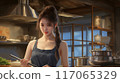 A woman enjoying cooking 117065329