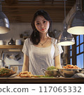 A woman enjoying cooking 117065332