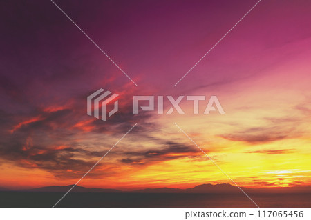 Colorful cloudy sky at sunset. The sun sets behind Mount Olympus, Greece 117065456