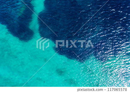 View of the bottom of the sea through transparent sea water View of the bottom of the sea through transparent sea water 117065578
