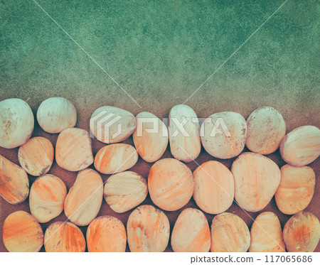 Abstract nature pebbles background. Gradient color. Stone background. Painted sea pebble beach Abstract nature pebbles background. Gradient color. Stone background. Painted sea pebble beach 117065686